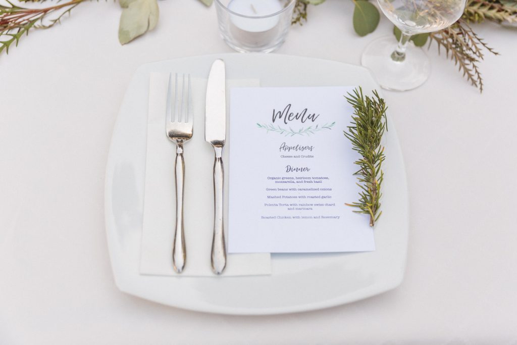 elegant white wedding place setting
