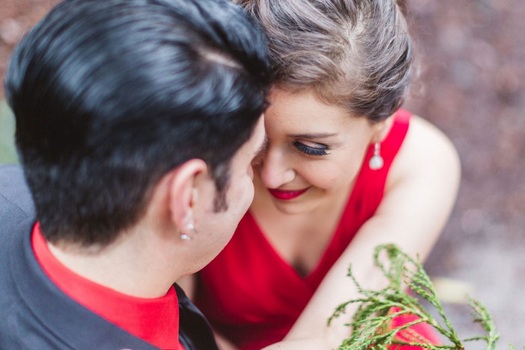couple canoodling with close up of eyelashes
