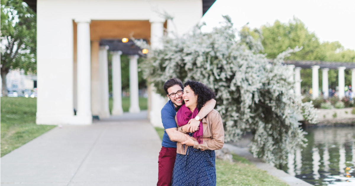 sweet lake merritt oakland LGBTQ engaged couple by pergola