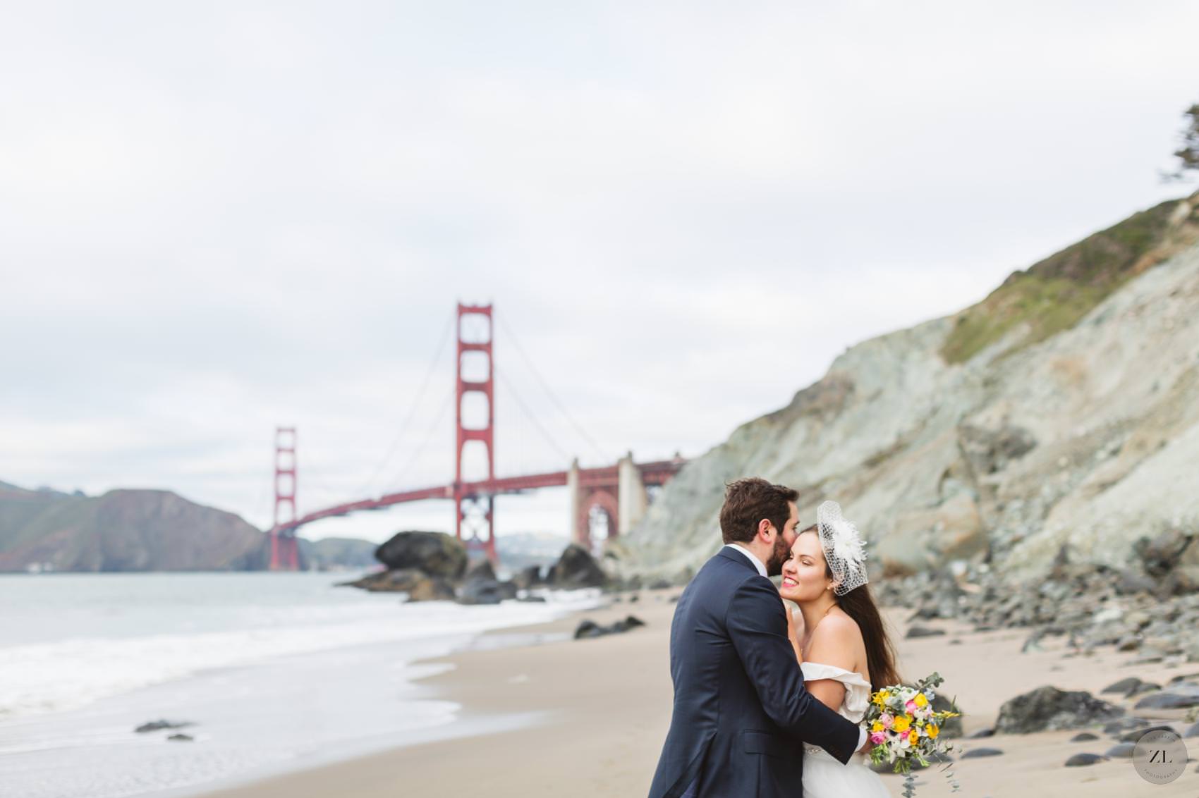 dramatic view of the Golden Gate Bridge at Marshall Beach wedding photos by Zoe Larkin Photography