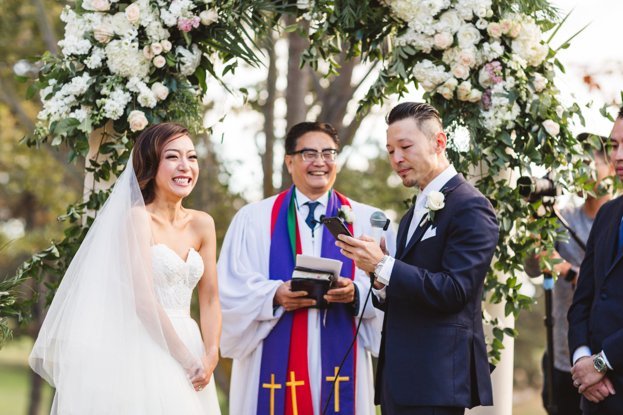 wedding ceremony picture at Sequoyah Country Clubwedding with bride laughing | How to choose the wedding photographer that's right for you