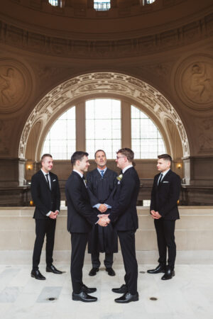 Two grooms during their City Hall wedding ceremony